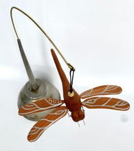 Dragonfly in Vintage oil can